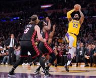LeBron James #23 attempts a fadeaway jumper.